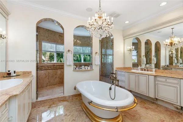 a bathroom with a sink toilet and a mirror