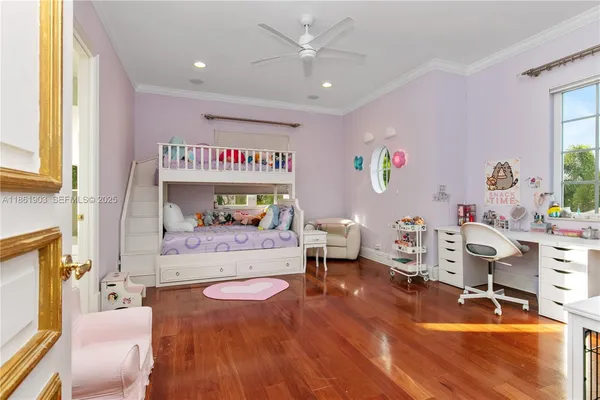 a front view of residential houses with yard and green space