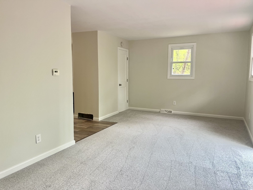 196 Munn Road Monson, MA 01057 - Photo 4 of 16 an empty room with windows