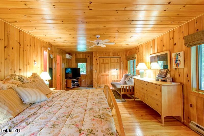 84 West Center Road West Stockbridge, MA 01266 - Photo 15 of 24 a bedroom with furniture and a wooden floor