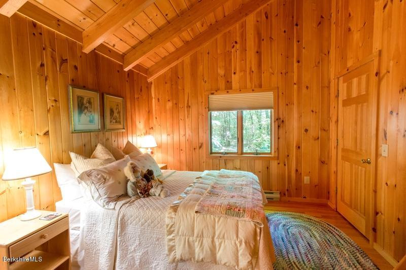 84 West Center Road West Stockbridge, MA 01266 - Photo 20 of 24 a bed sitting in a bedroom next to a window