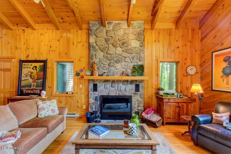 84 West Center Road West Stockbridge, MA 01266 - Photo 6 of 24 a living room with furniture a fireplace and a table