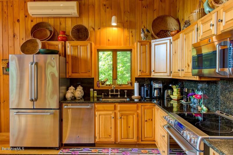 84 West Center Road West Stockbridge, MA 01266 - Photo 7 of 24 a kitchen with stainless steel appliances granite countertop a refrigerator and a stove