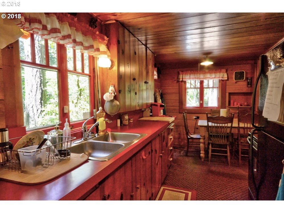 75215 East Road 28 A Rhododendron, OR 97049 - Photo 10 of 27 a kitchen with sink refrigerator and large window