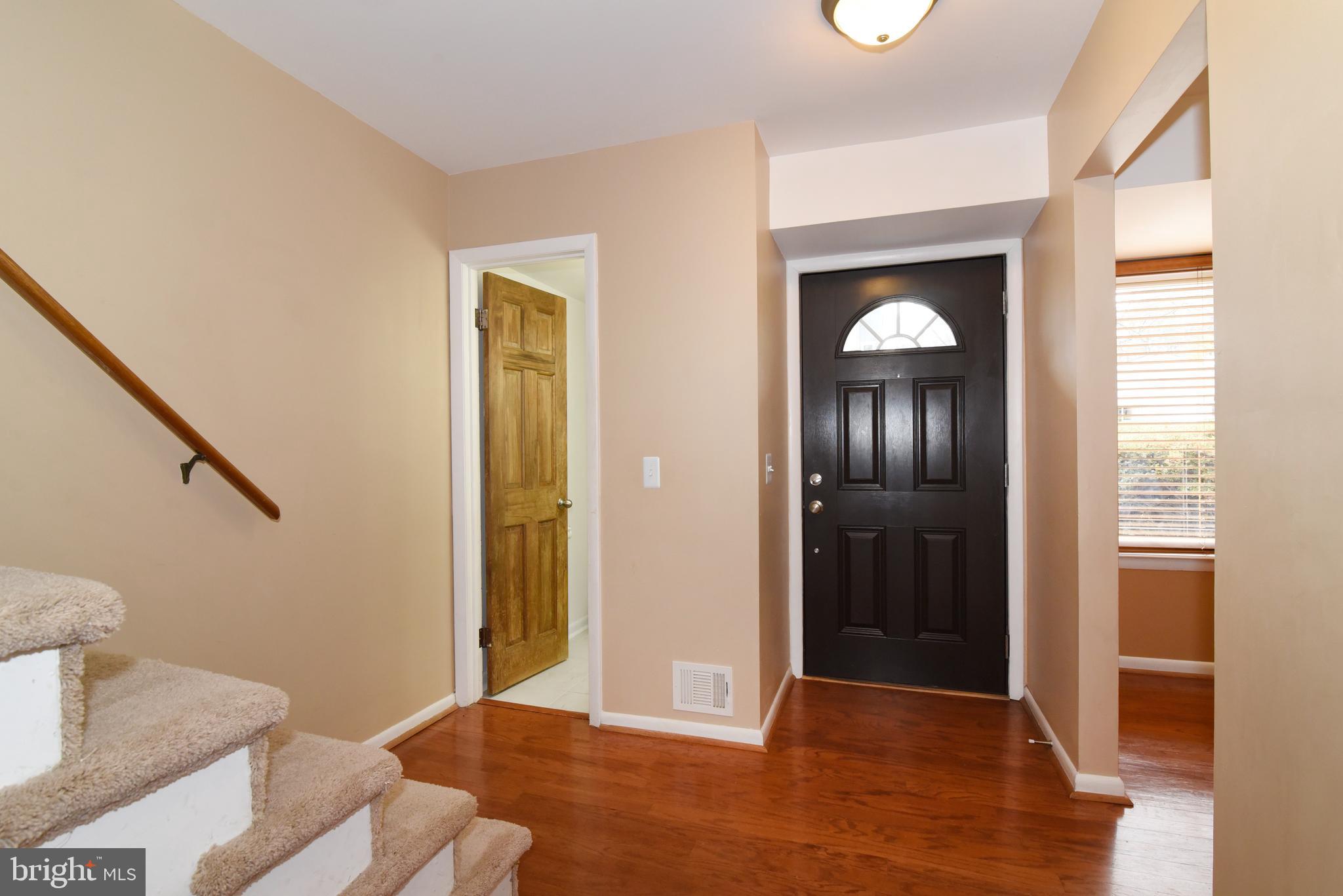 2334 Generation Drive Reston, VA 20191 - Photo 5 of 55 a view of livingroom with furniture and window