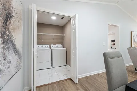 a utility room with washer and dryer