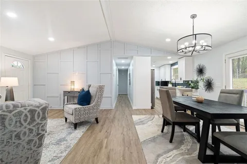 a view of a dining room with furniture