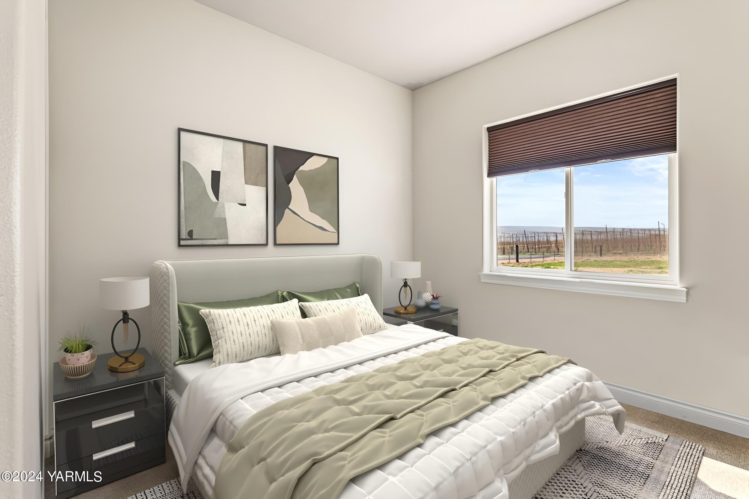 245 West Huntzinger Road Selah, WA 98942 - Photo 13 of 54 a bedroom with a bed and a window