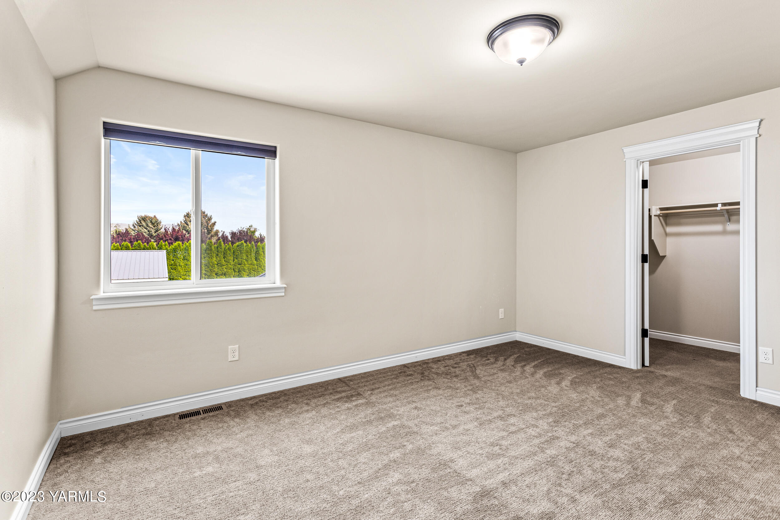 245 West Huntzinger Road Selah, WA 98942 - Photo 18 of 54 an empty room with a window