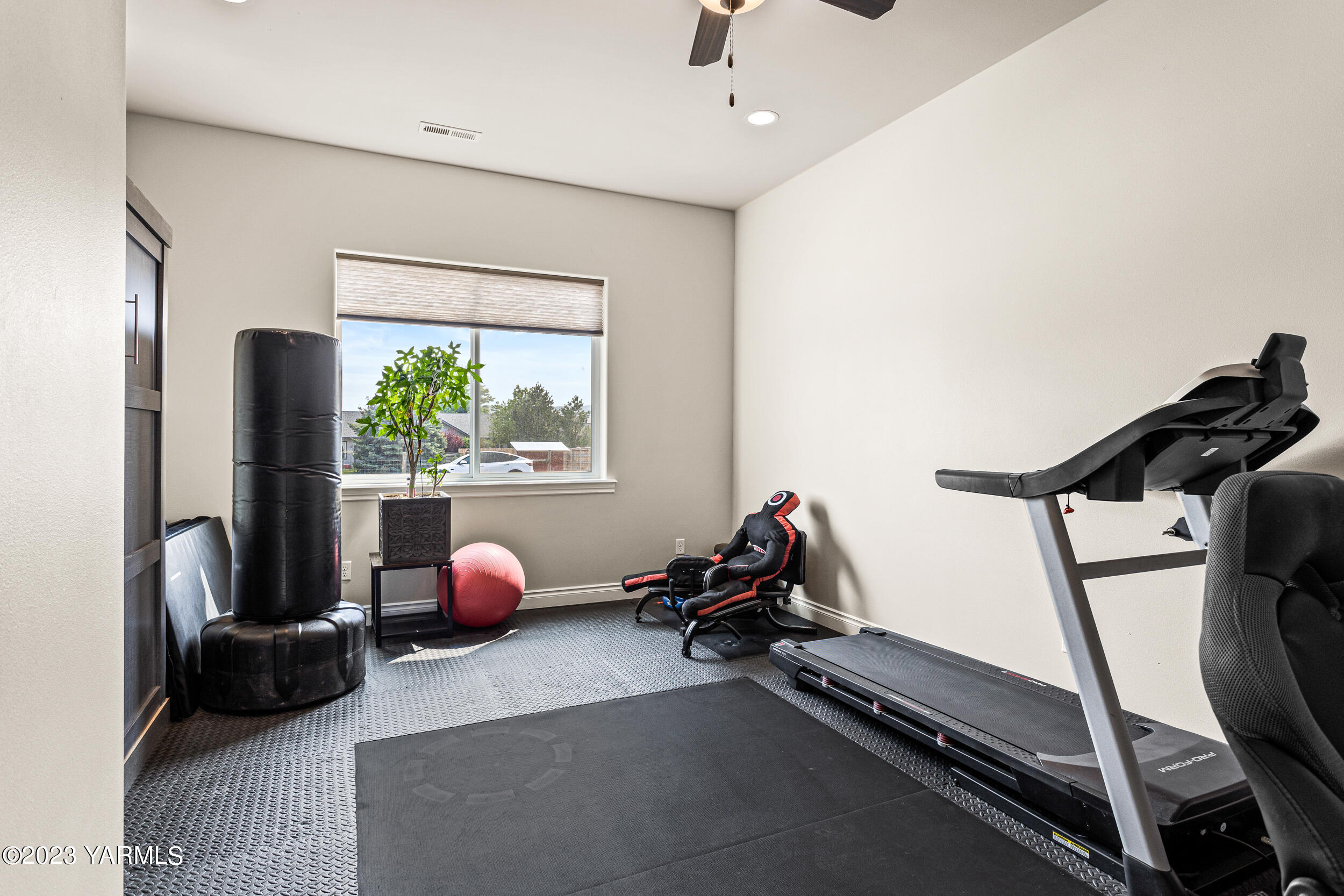 245 West Huntzinger Road Selah, WA 98942 - Photo 26 of 54 a bedroom with furniture and a window