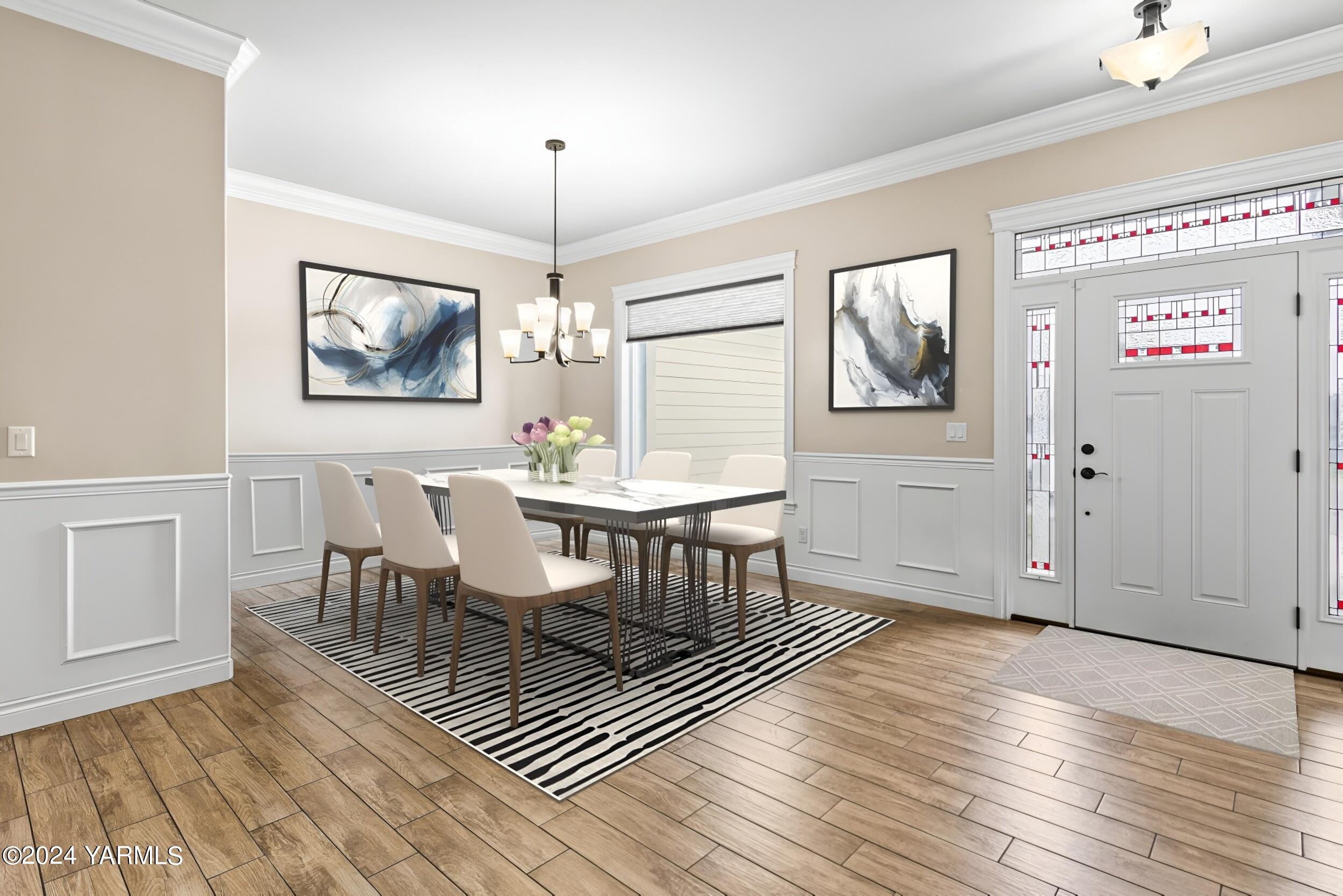 245 West Huntzinger Road Selah, WA 98942 - Photo 3 of 54 a view of a dining room with furniture wooden floor and chandelier