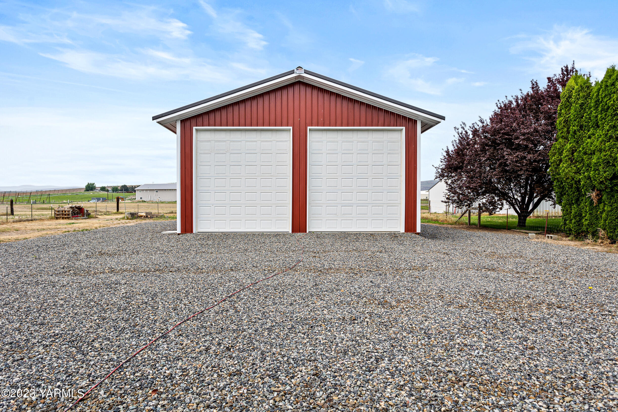 245 West Huntzinger Road Selah, WA 98942 - Photo 34 of 54 a front view of a house with a yard
