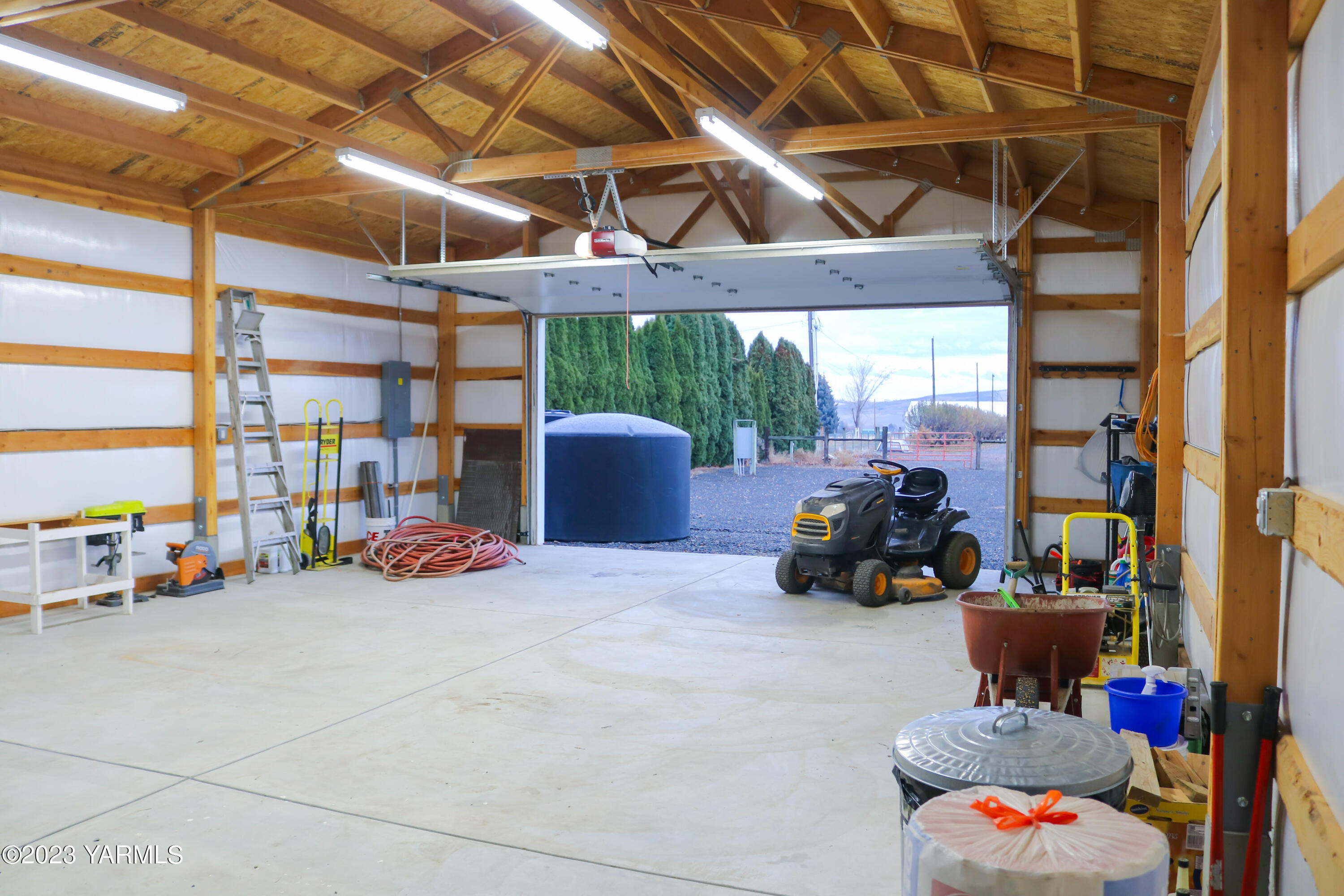 245 West Huntzinger Road Selah, WA 98942 - Photo 39 of 54 a building outdoor space with patio furniture and potted plants