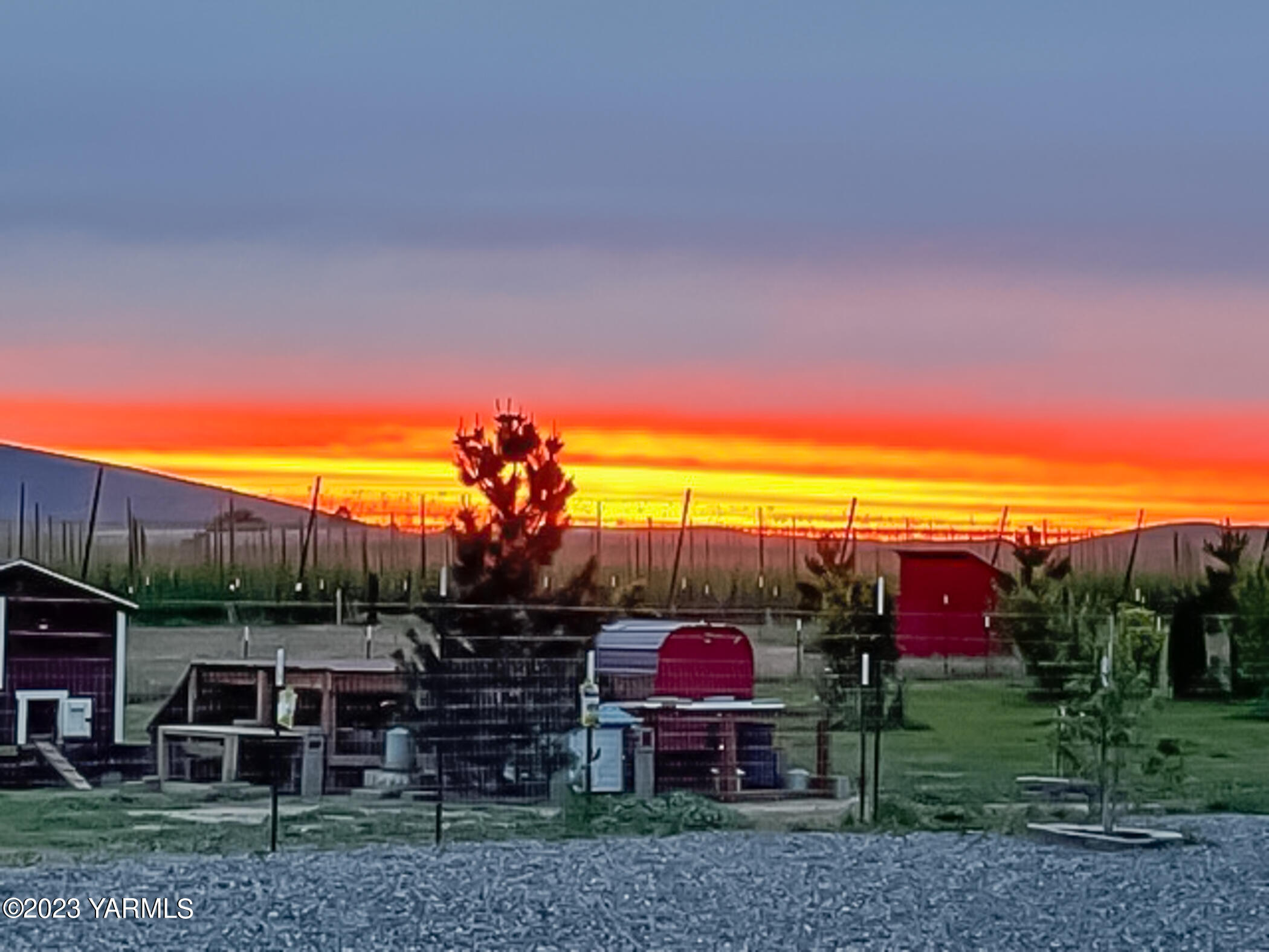 245 West Huntzinger Road Selah, WA 98942 - Photo 49 of 54 a view of a house with a backyard