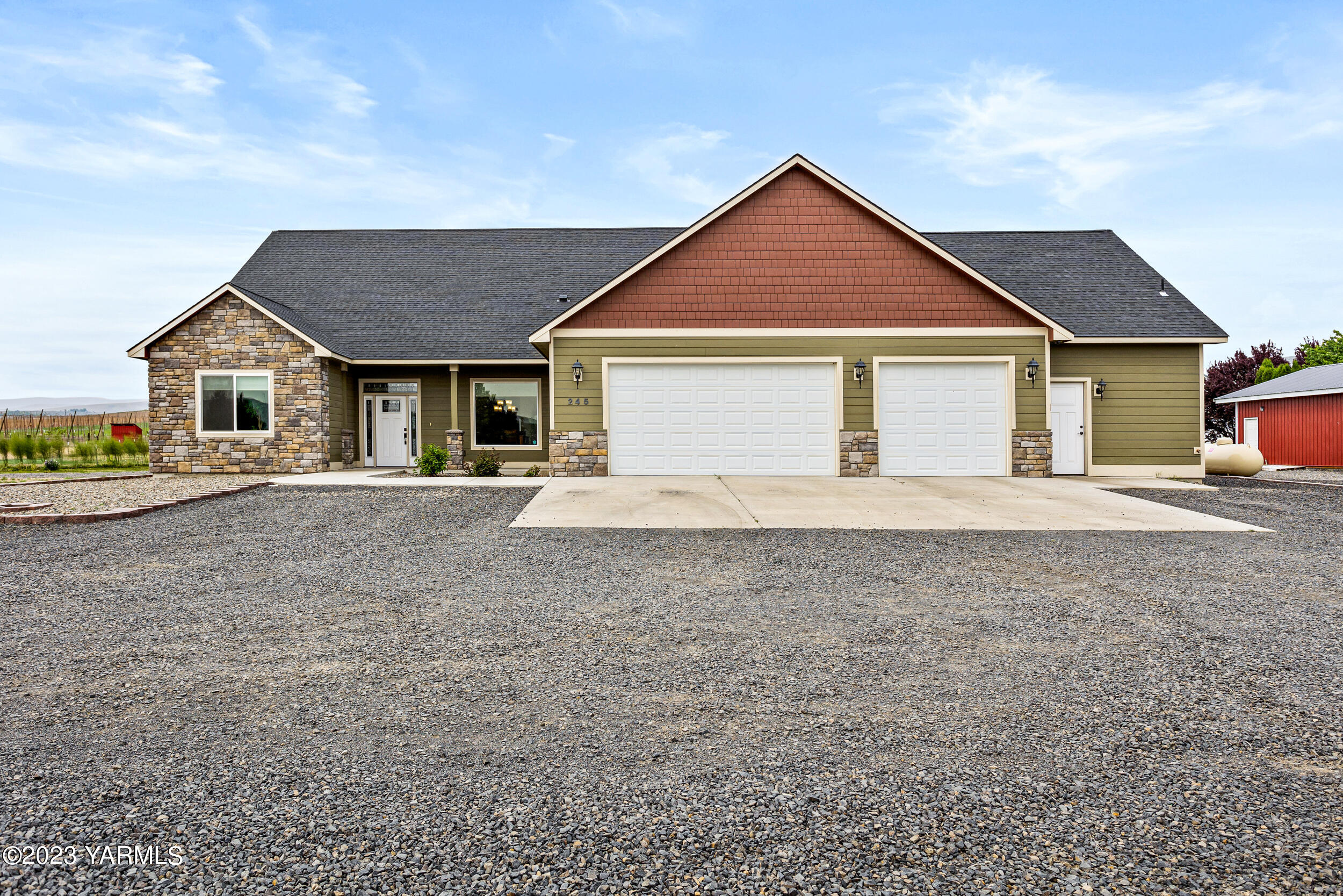 245 West Huntzinger Road Selah, WA 98942 - Photo 54 of 54 a front view of a house with a yard