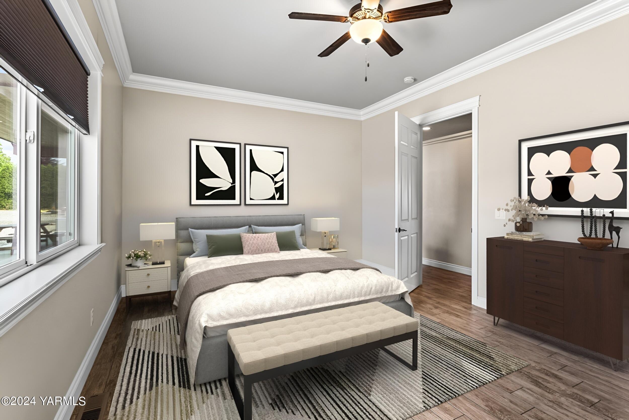 245 West Huntzinger Road Selah, WA 98942 - Photo 9 of 54 a bedroom with a bed and wooden floor