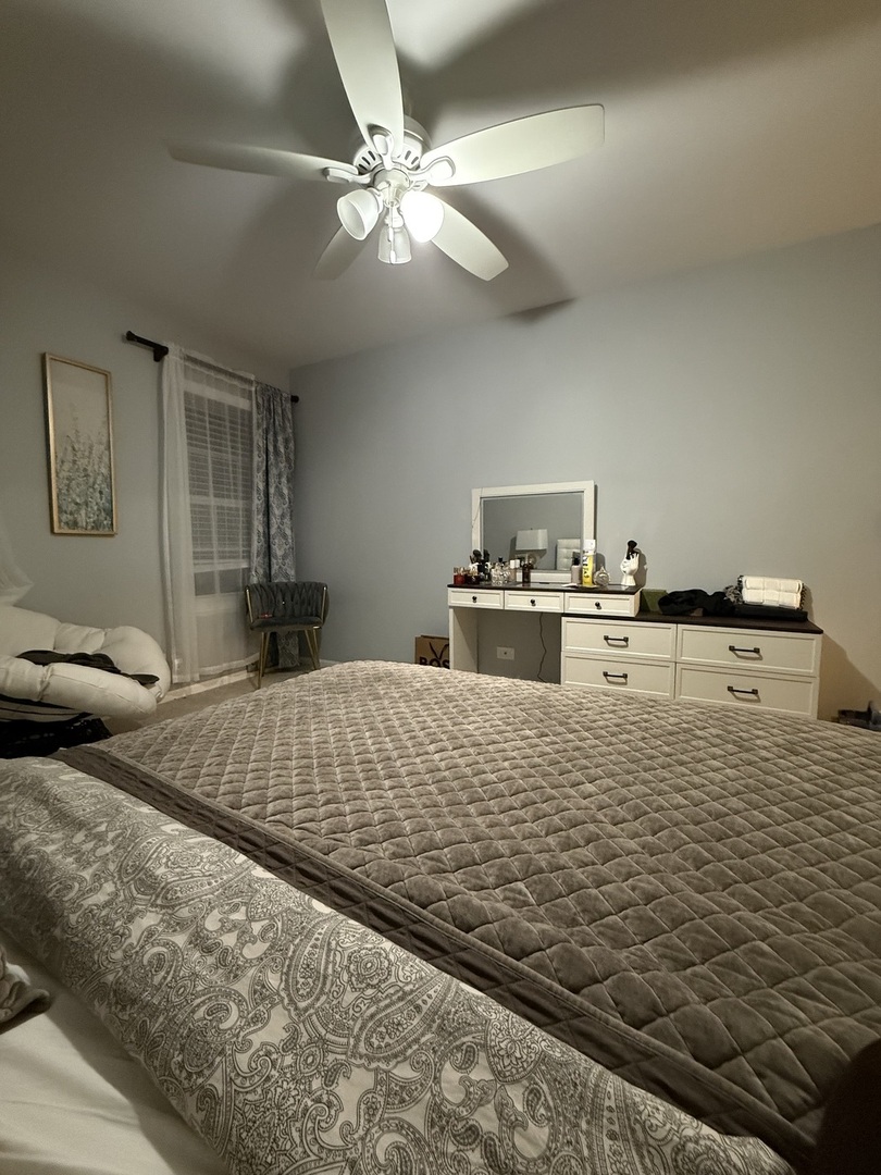 1063 Stillwater Road, Unit 1063 Elgin, IL 60120 - Photo 8 of 17 a large white bed in a white room