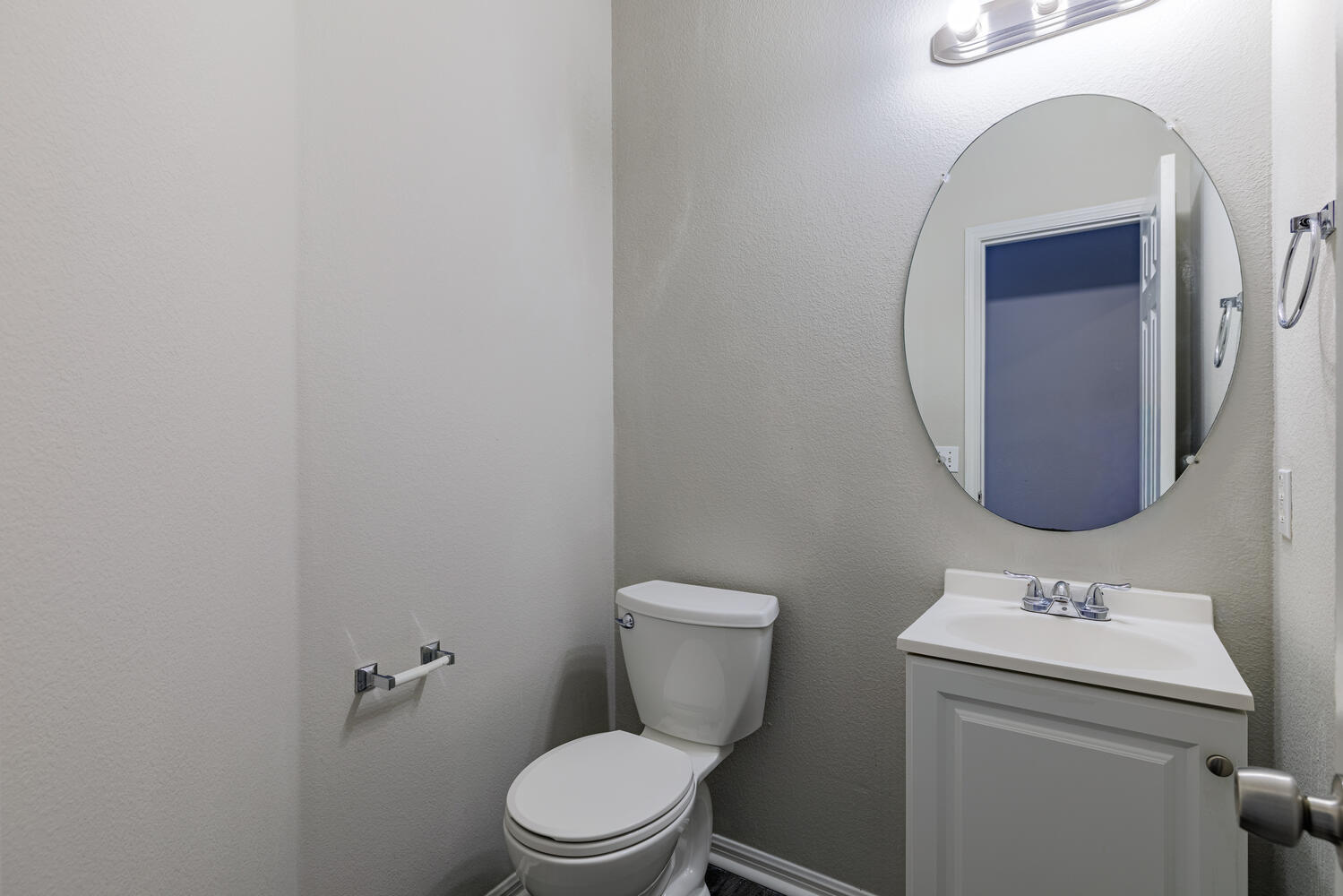 11402 Marshall Street Manor, TX 78653 - Photo 14 of 34 Half bath with vanity and a textured wall