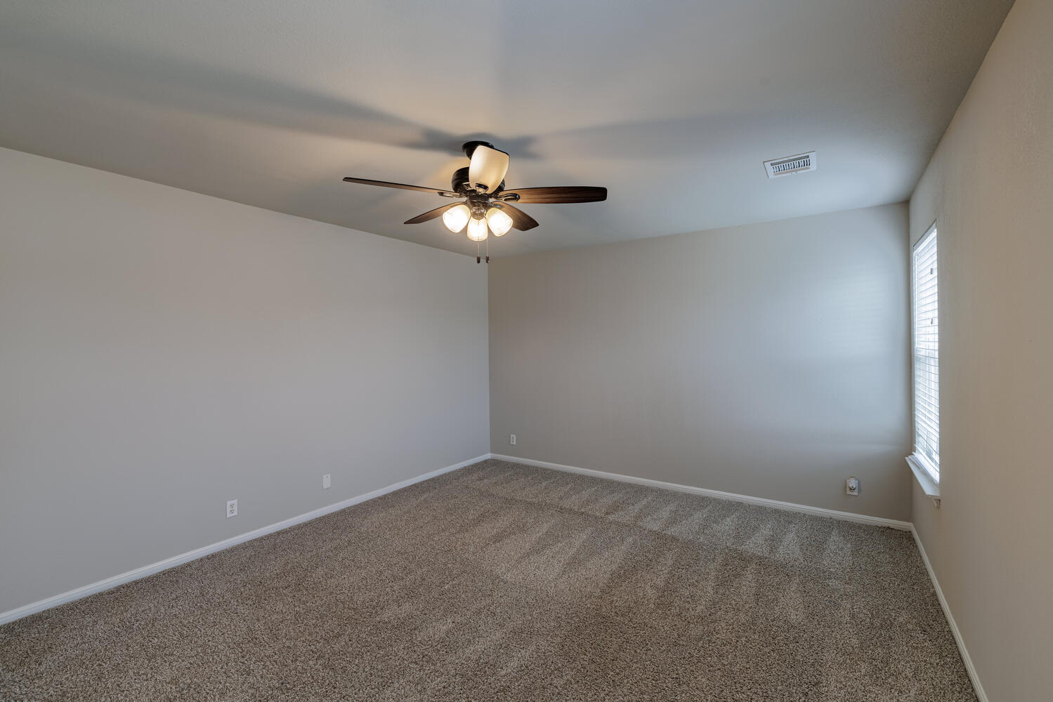 11402 Marshall Street Manor, TX 78653 - Photo 24 of 34 Unfurnished room with carpet and a ceiling fan