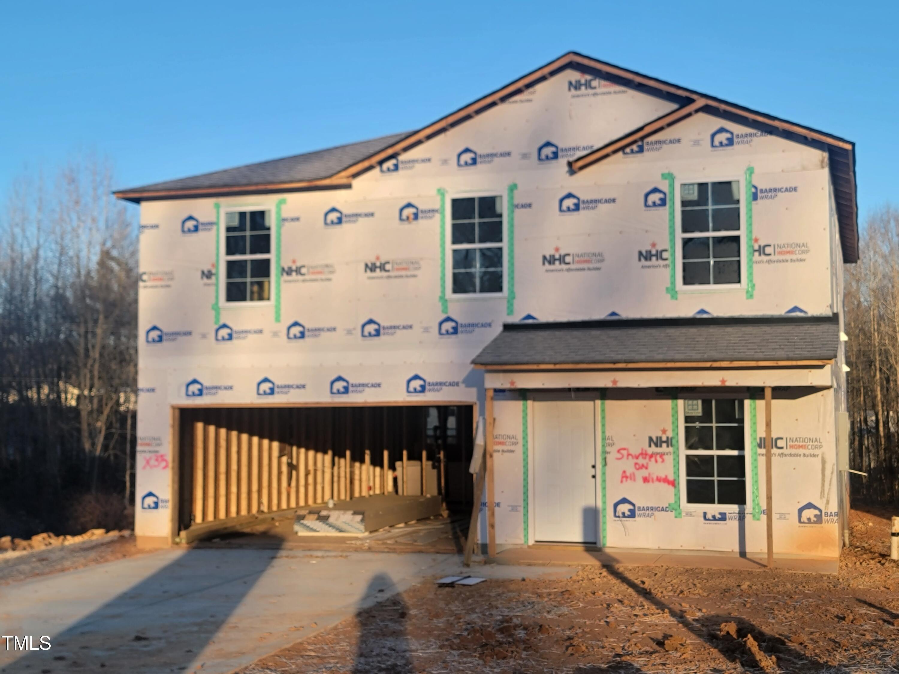 232 Keith Place Roxboro, NC 27573 - Photo 2 of 8 a front view of a building with glass windows
