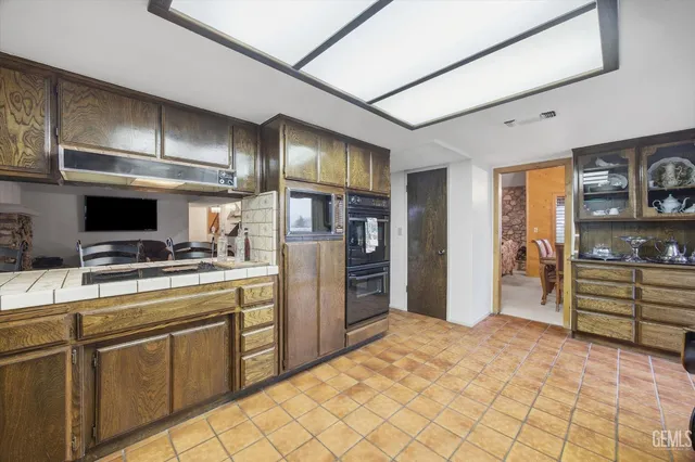 a view of a balcony with furniture