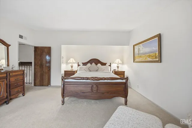 a view of storage and utility room with washer and dryer