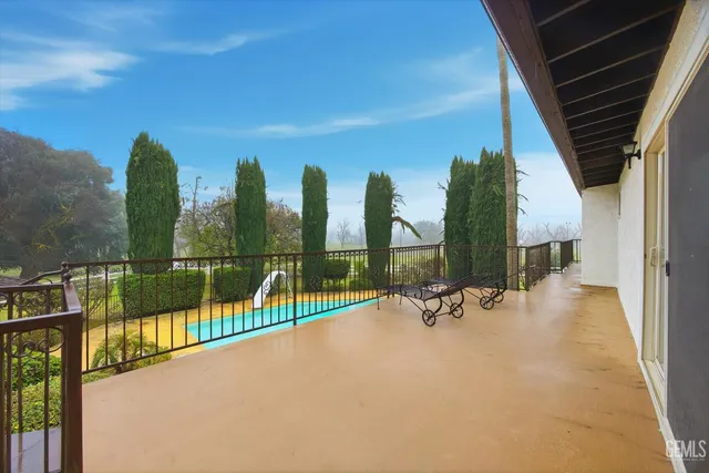 a view of an outdoor space with swimming pool