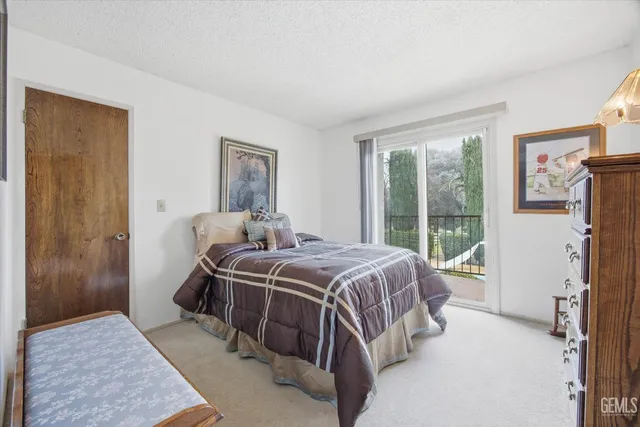 an aerial view of a house with a big yard