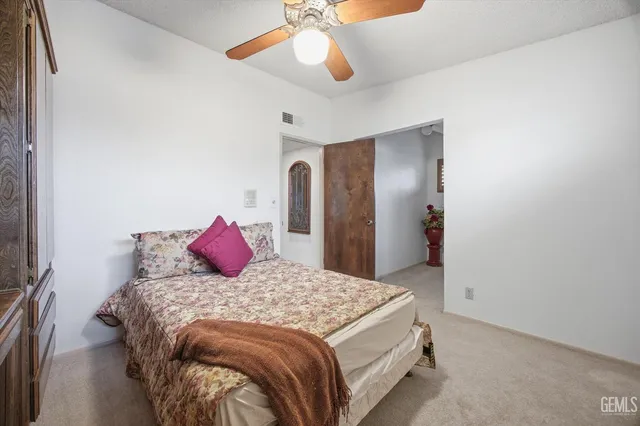 a view of a swimming pool with a yard and mountain