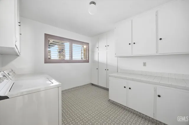 a view of a swimming pool with an ocean view