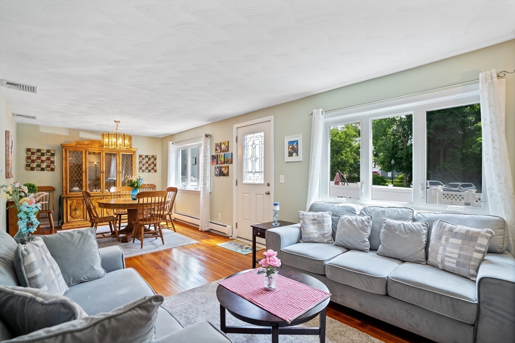 19 Belcher Street Winthrop, MA 02152 - Photo 6 of 33 a living room with furniture and a large window