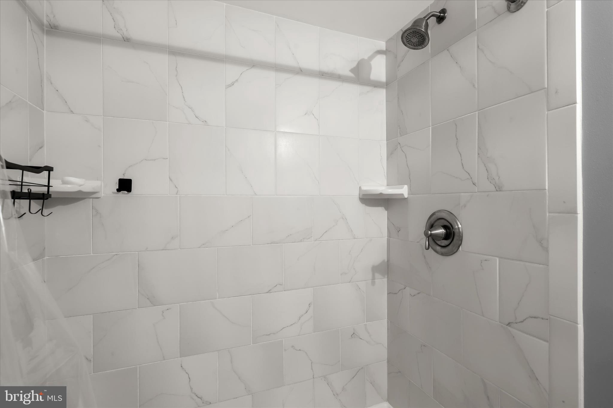 1207 Brewster Street Halethorpe, MD 21227 - Photo 28 of 34 a bathroom with a shower