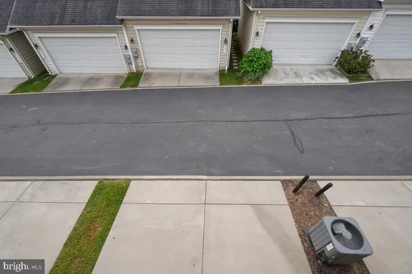 a view of a bathroom with a sink and window
