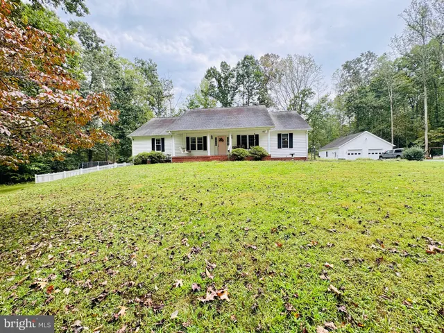 a house view with a garden space