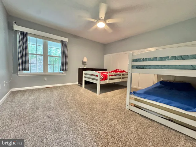 a view of a livingroom with wooden floor