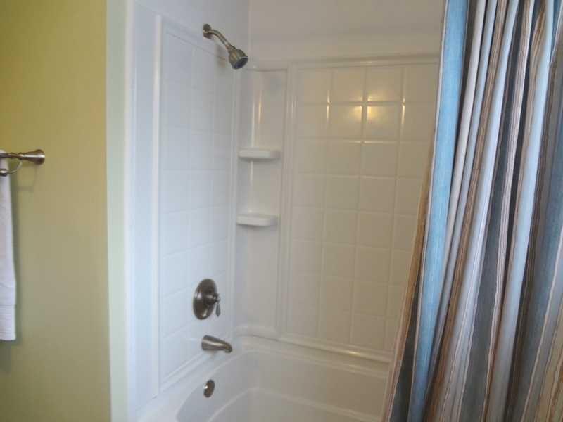 10 Blacksmith Road, Unit 10 Wells, ME 04090 - Photo 25 of 28 Bathroom. New tub, surround and faucets.