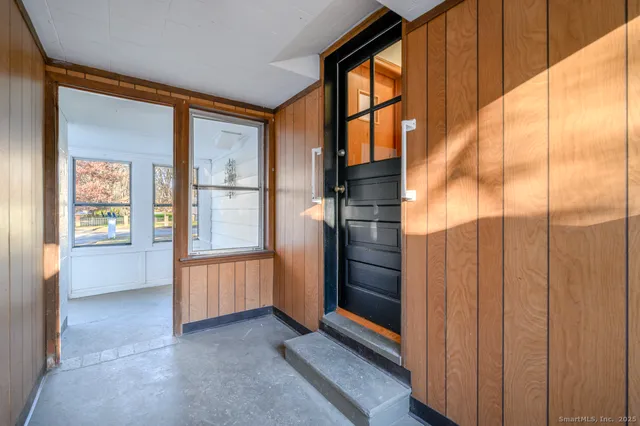 an empty room with windows