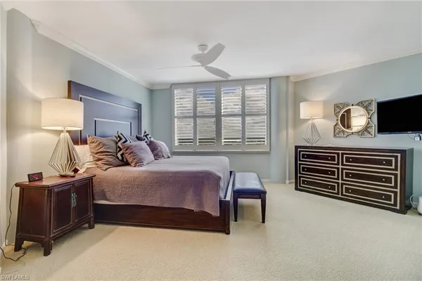 a bedroom with a bed and a closet