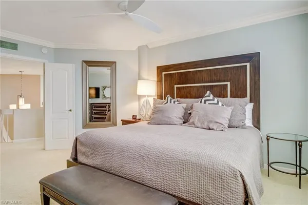 a en suite bathroom with double sink and a mirror
