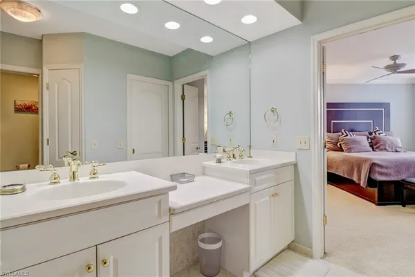 a bathroom with a tub and shower