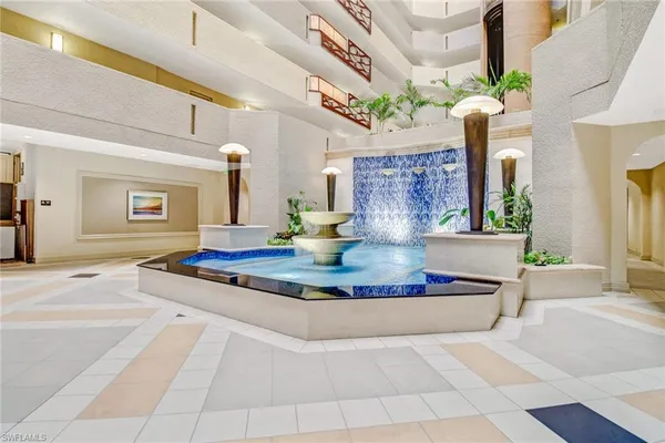 a outdoor view of a house with sitting area