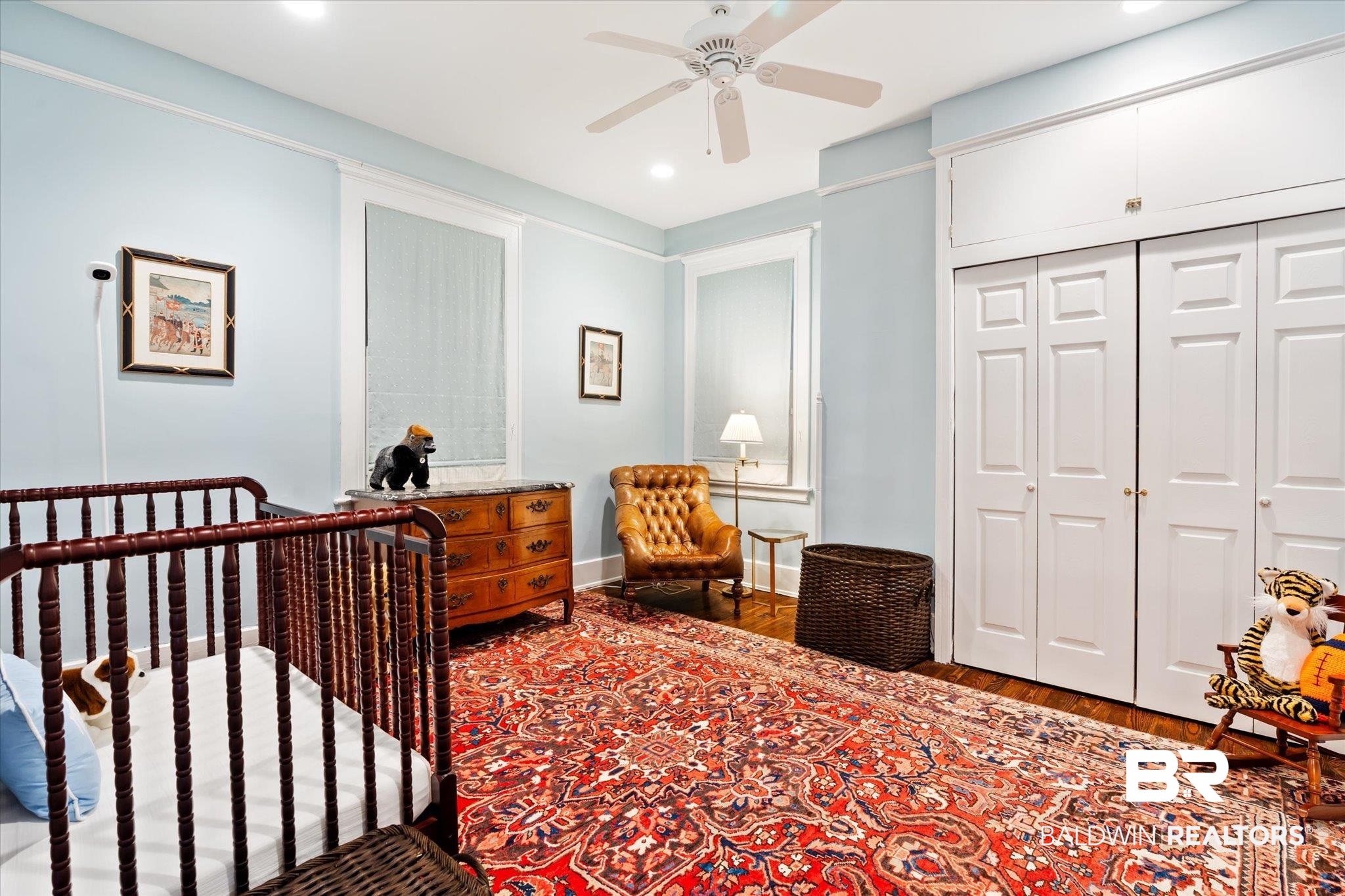 68 North Monterey Street Mobile, AL 36604 - Photo 23 of 30 Bedroom with a closet, hardwood / wood-style floors, and ceiling fan
