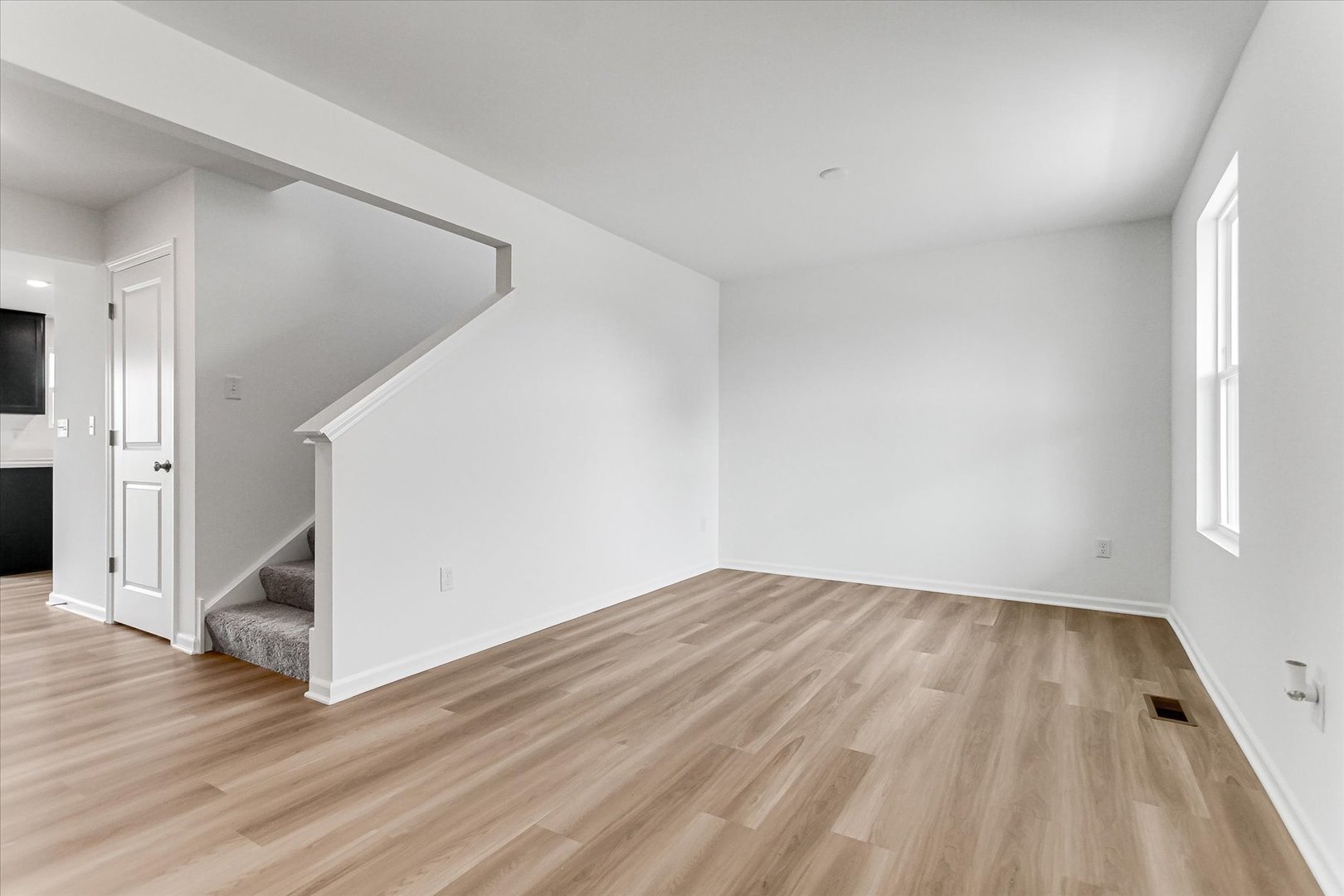 620 Endicott Road South Elgin, IL 60177 - Photo 3 of 30 wooden floor in an empty room with a window