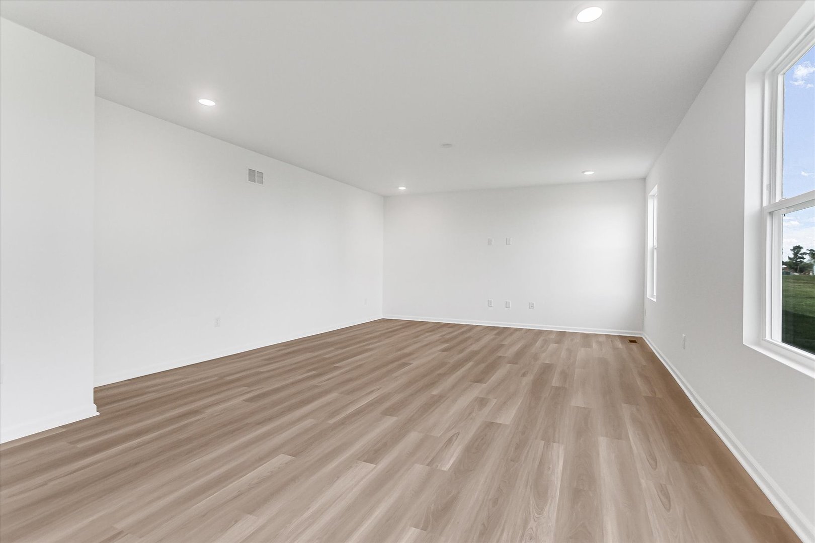 620 Endicott Road South Elgin, IL 60177 - Photo 9 of 30 a view of empty room with wooden floor and fan