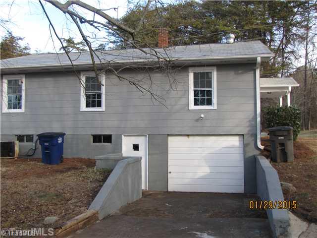 2000 Pope Road Winston-Salem, NC 27127 - Photo 12 of 14 Exterior Back. One car garage and plenty of parking at this home.