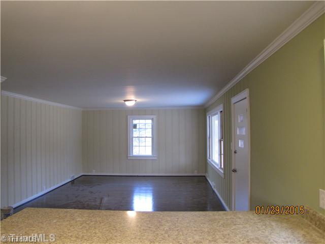 2000 Pope Road Winston-Salem, NC 27127 - Photo 5 of 14 Living Room. Looking out into the LR from the Kitchen. LR is large and has hardwood floors and a picture window.