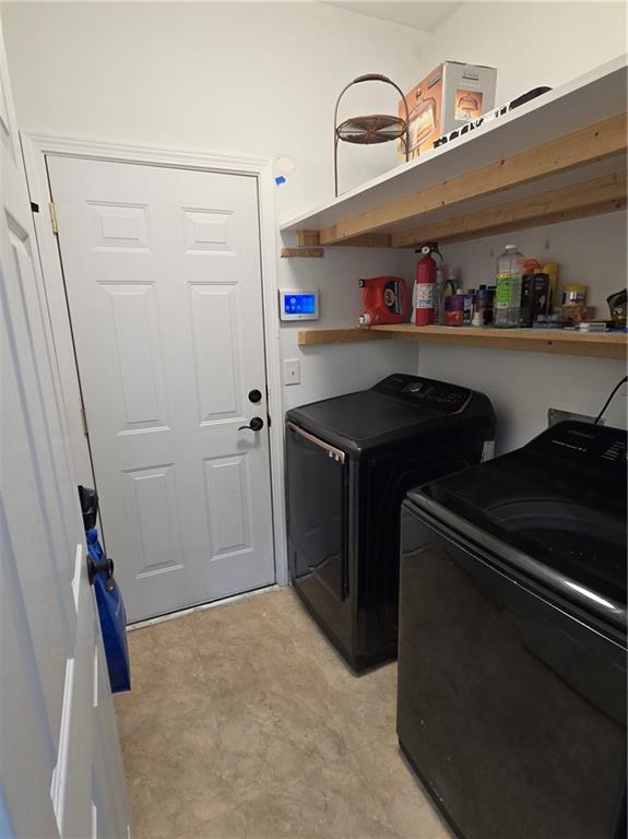 2900 Suttles Drive Southwest Atlanta, GA 30331 - Photo 12 of 23 a utility room with dryer and washer