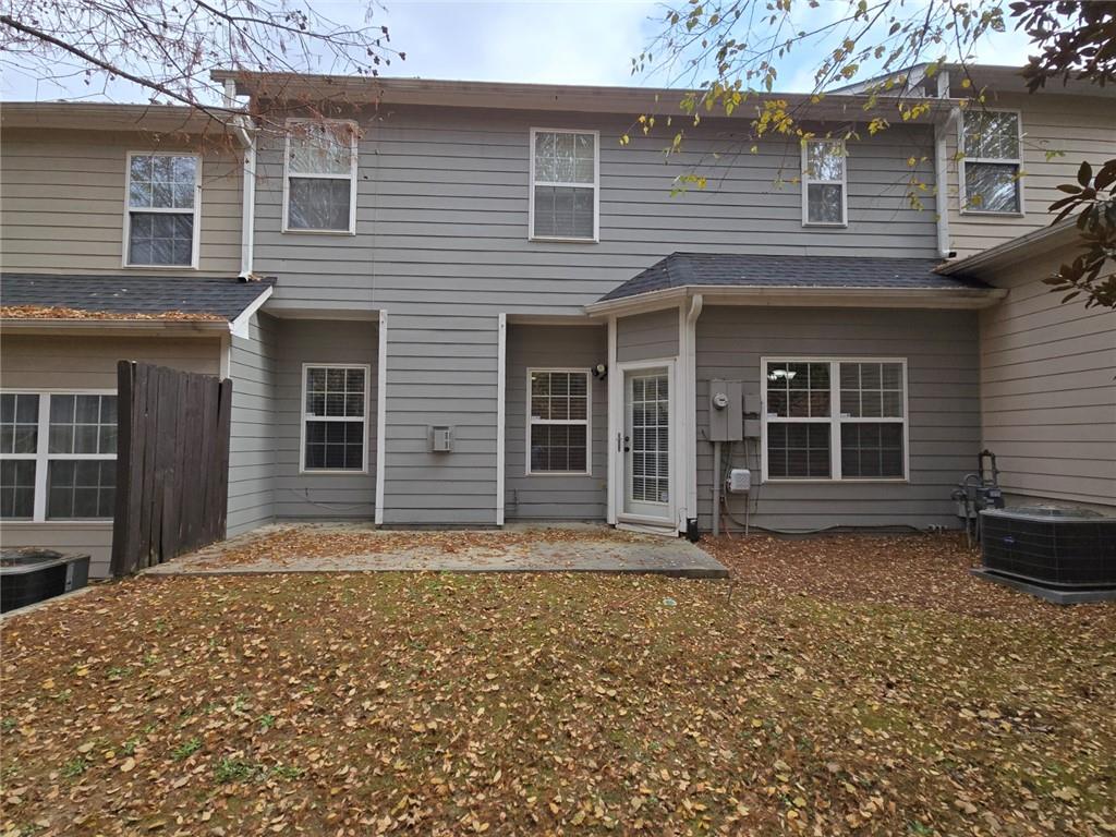 2900 Suttles Drive Southwest Atlanta, GA 30331 - Photo 19 of 23 a front view of a house with a yard