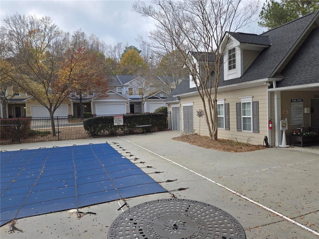2900 Suttles Drive Southwest Atlanta, GA 30331 - Photo 21 of 23 a front view of a house with a yard