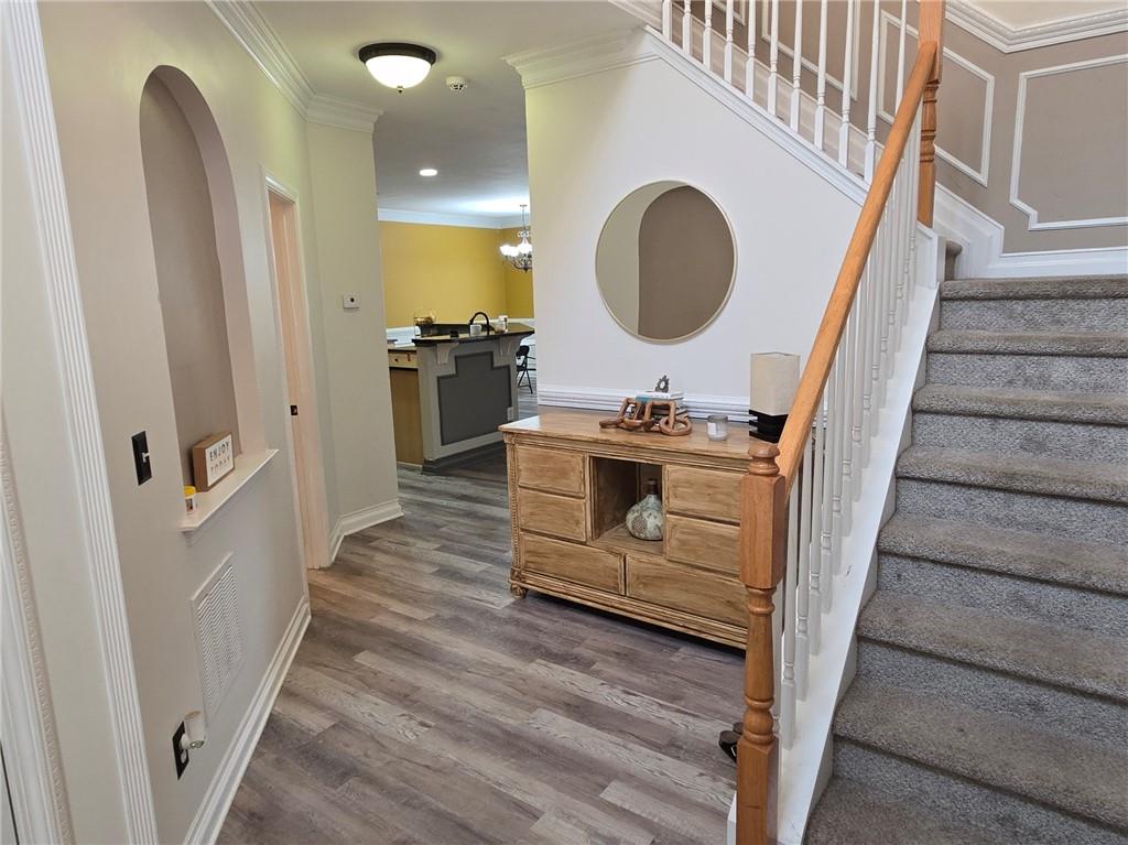 2900 Suttles Drive Southwest Atlanta, GA 30331 - Photo 4 of 23 a bathroom with a sink a mirror a vanity and a shower